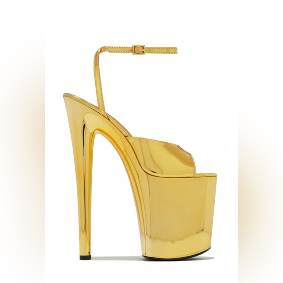 Brand New in box. Tried on one heel. Half a size too big. - Picture 3 of 5